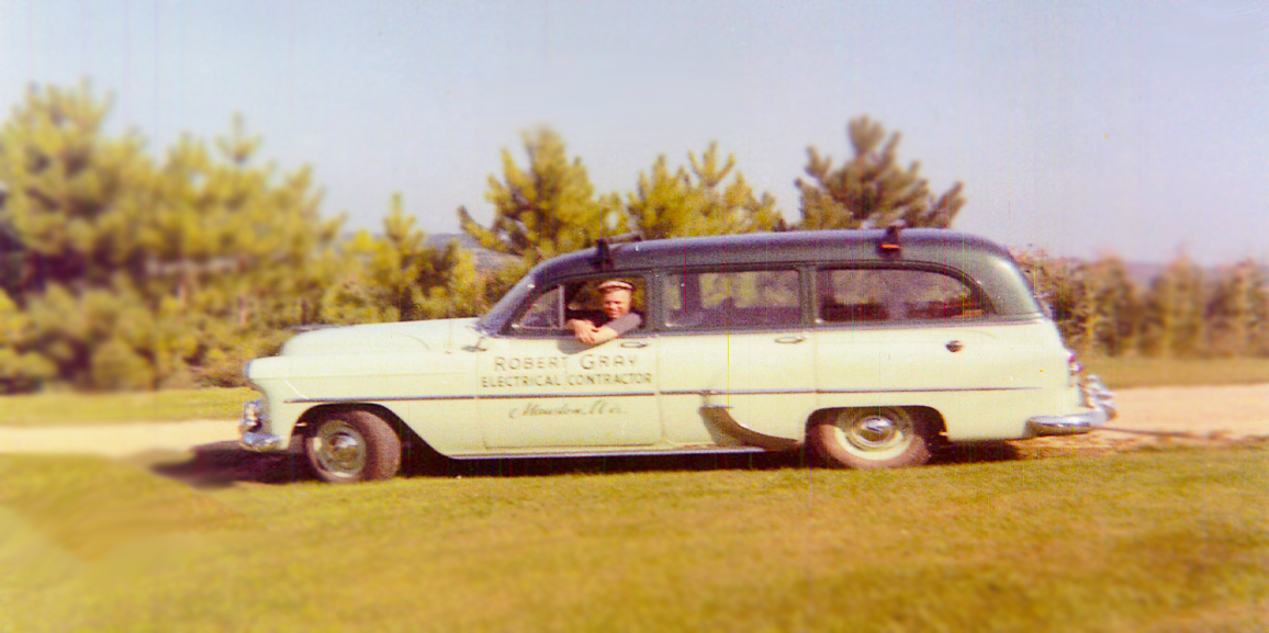 Bob Gray in the original station wagon lettered "Robert Gray Electrical Contractor, Mauston, Wis."